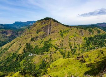 A panoramic view of Adam's Peak - tall conical mountain located in central Sri Lanka